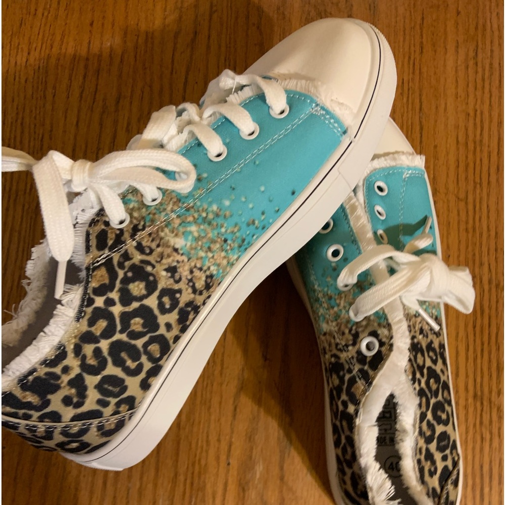 Shoes-sneakers size 8. Cheetah and turquoise blend.  Fashion fringe for Spring.